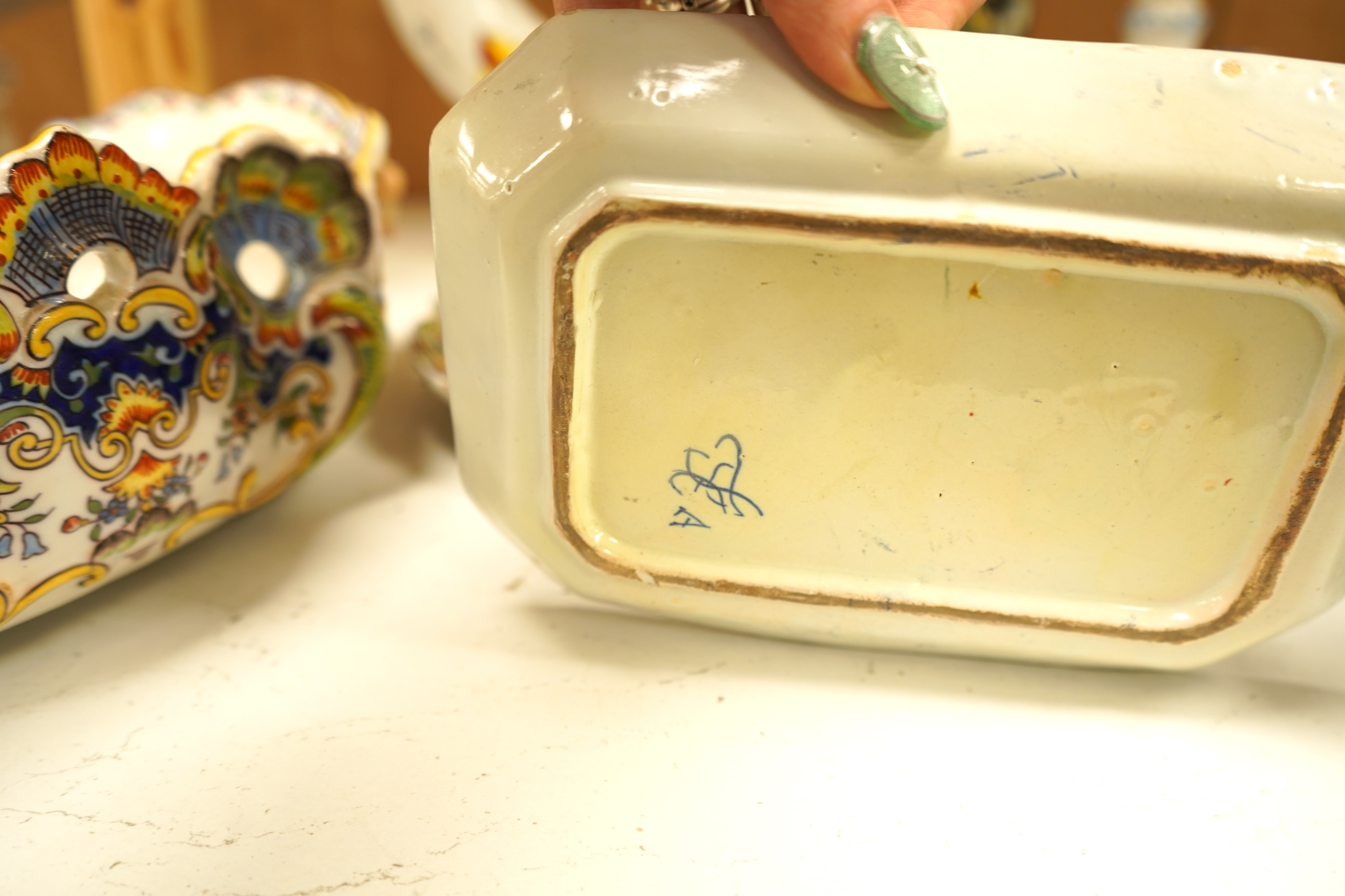 A collection of early 20th century French faience pieces To include dishes, an inkwell and a large ewer, 42cm high